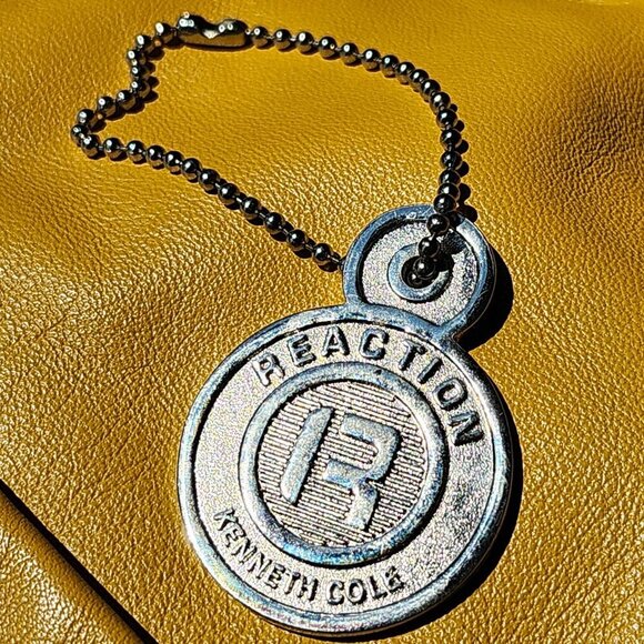 REACTION KENNETH COLE Key Chain Metal Decor Luggage Tag Bag Charm - Picture 1 of 2